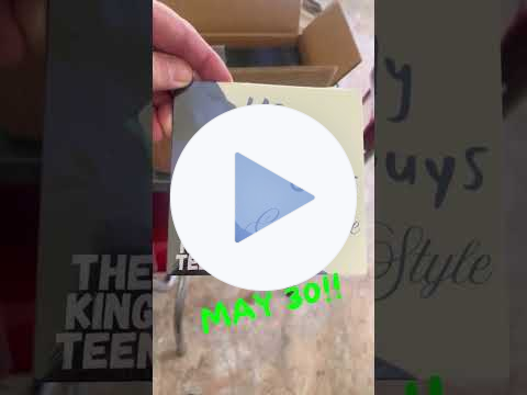 YouTube short video of a hand pulling a CD out of a box