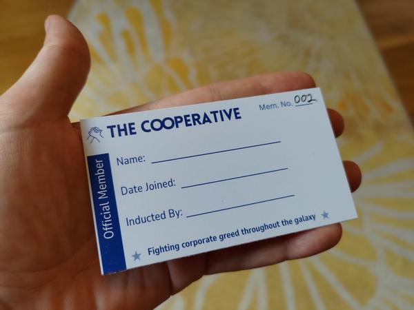 Membership card for The Cooperative: Fighting corporate greed throughout the galaxy