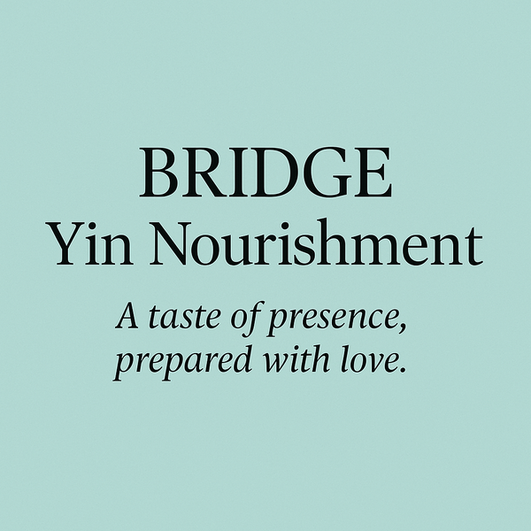 Bowl of golden coconut lentil soup, nourishing and grounding.