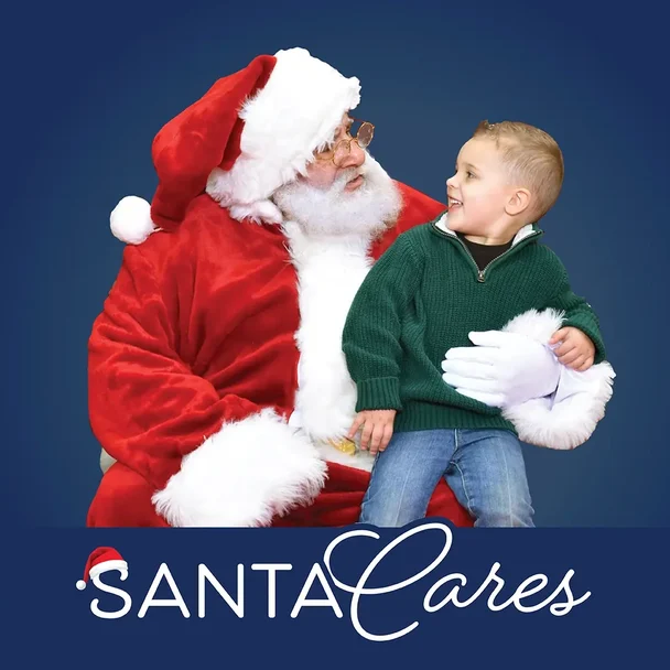 Santa Cares child on Santa's lap