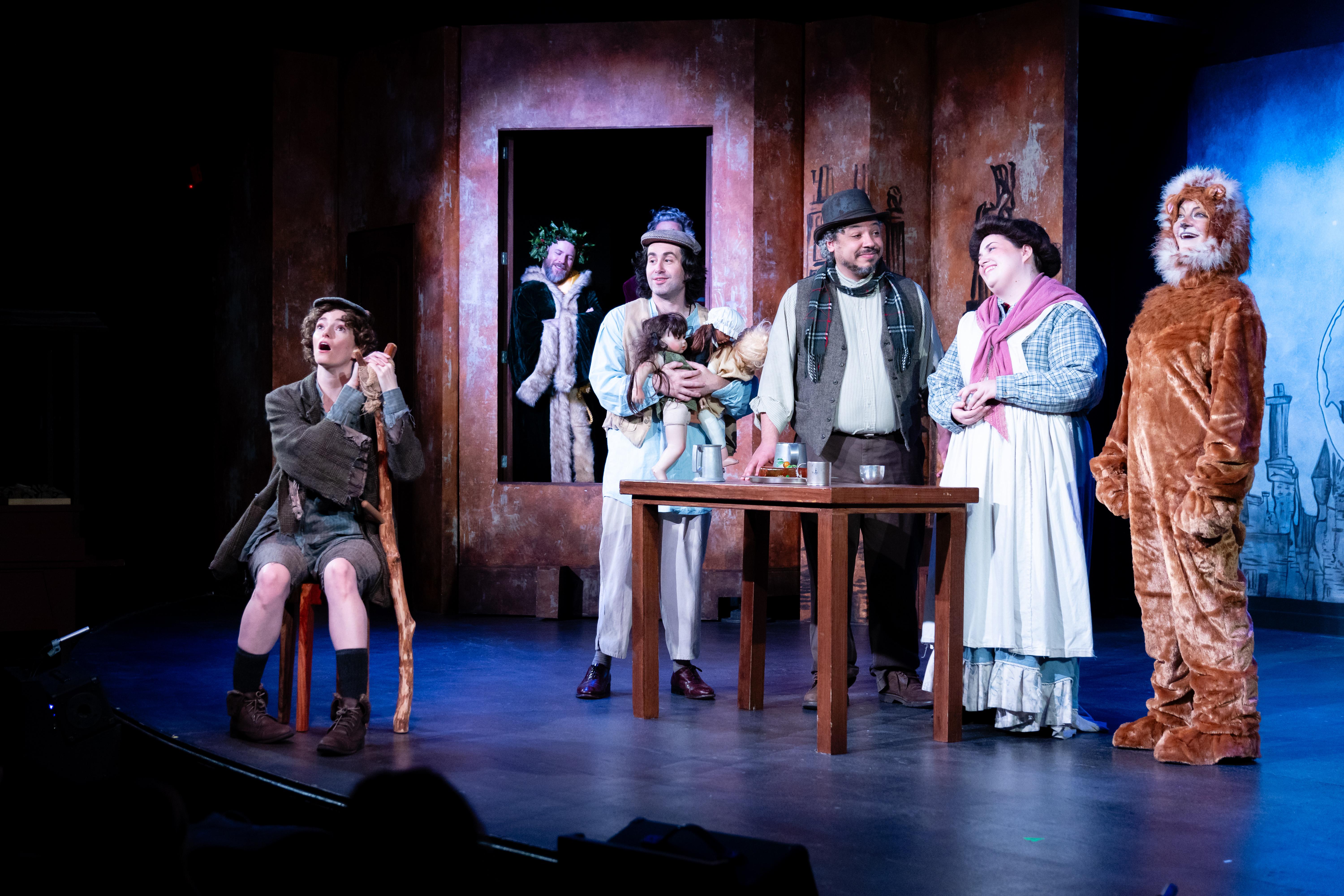 Christmas Carol cast with lion