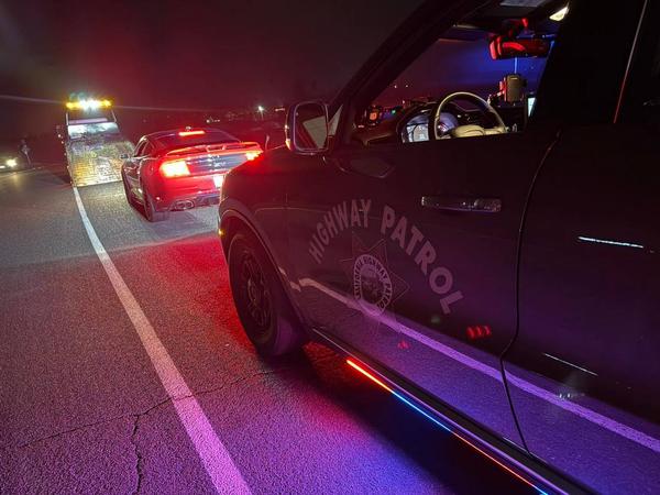 Goodbye for now: the Mustang being towed away.