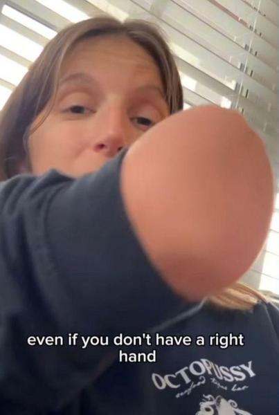 The woman in her video, flipping the deputy the finger.