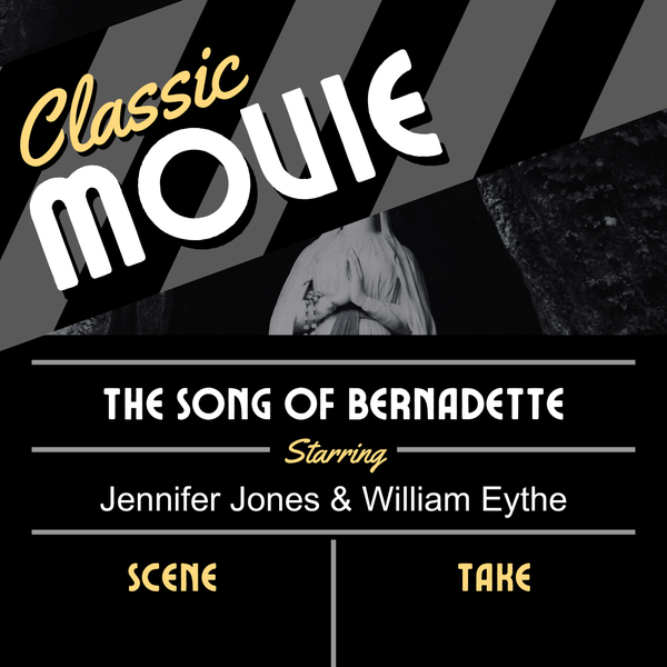 A black and white clapper with a white statue holding her hands in a prayer position in the background of the clapper. 