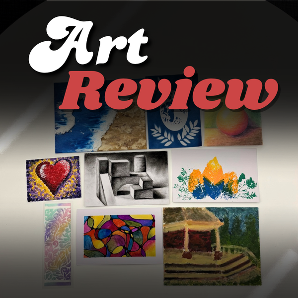 Various artworks from previous art events are on a table with "Art Review" overlayed on top.