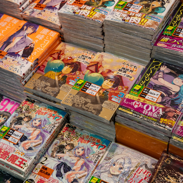Stacks of manga books in rows.