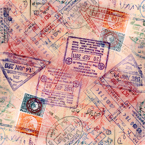 Different stamps are stamped on top of each other in different color inks.