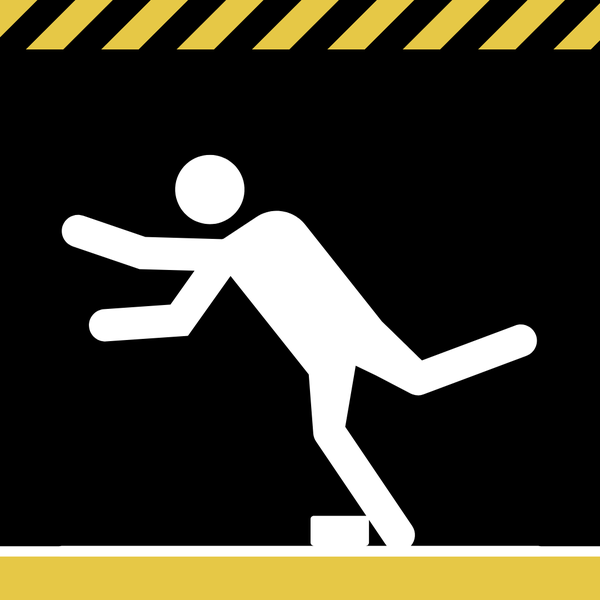 There is a black, yellow, and white theme with caution strips at the top and a stick figure tripping over a block in the center.