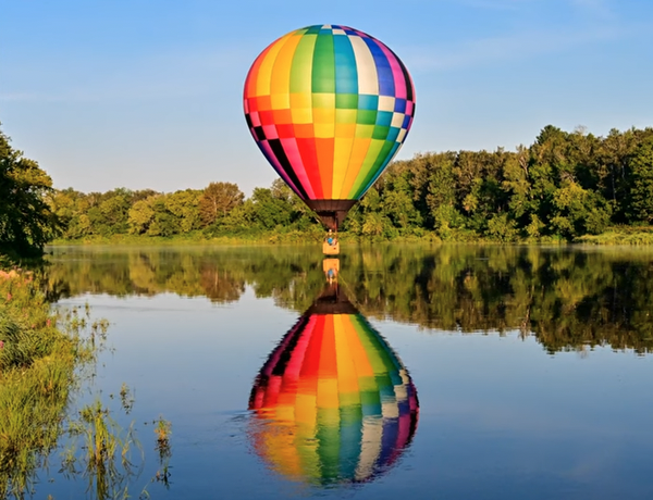 hot air balloon over river