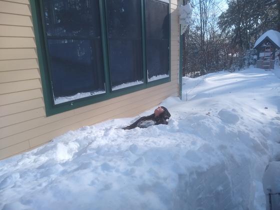 person sleeping on snow
