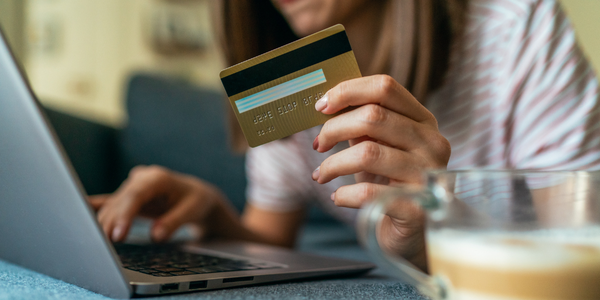 A woman making an online card payment.