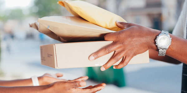 A parcel and packages being delivered.