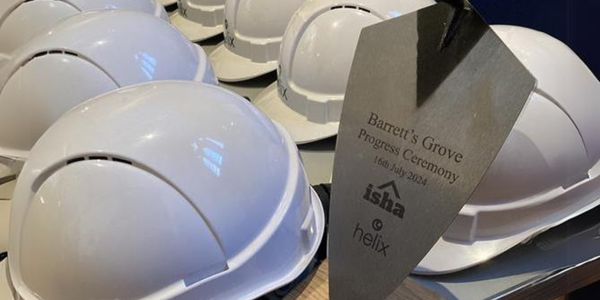 Barrett's Grove Progress Ceremony, image of hard hats and commemorative trowel