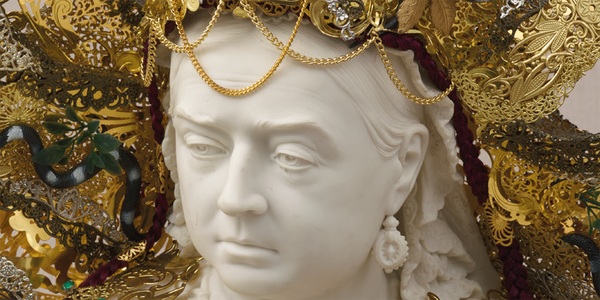 A bust of Queen Victoria with gold jewellery