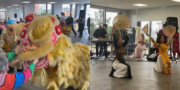 A traditional dragon dance performer engages with the audience at a Lunar New Year celebration in 2026.
