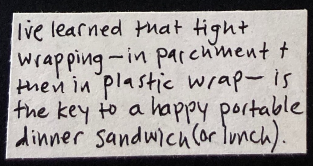 I've learned that tight wrapping — in parchment and then in plastic wrap — is the key to a happy portable dinner sandwich. 