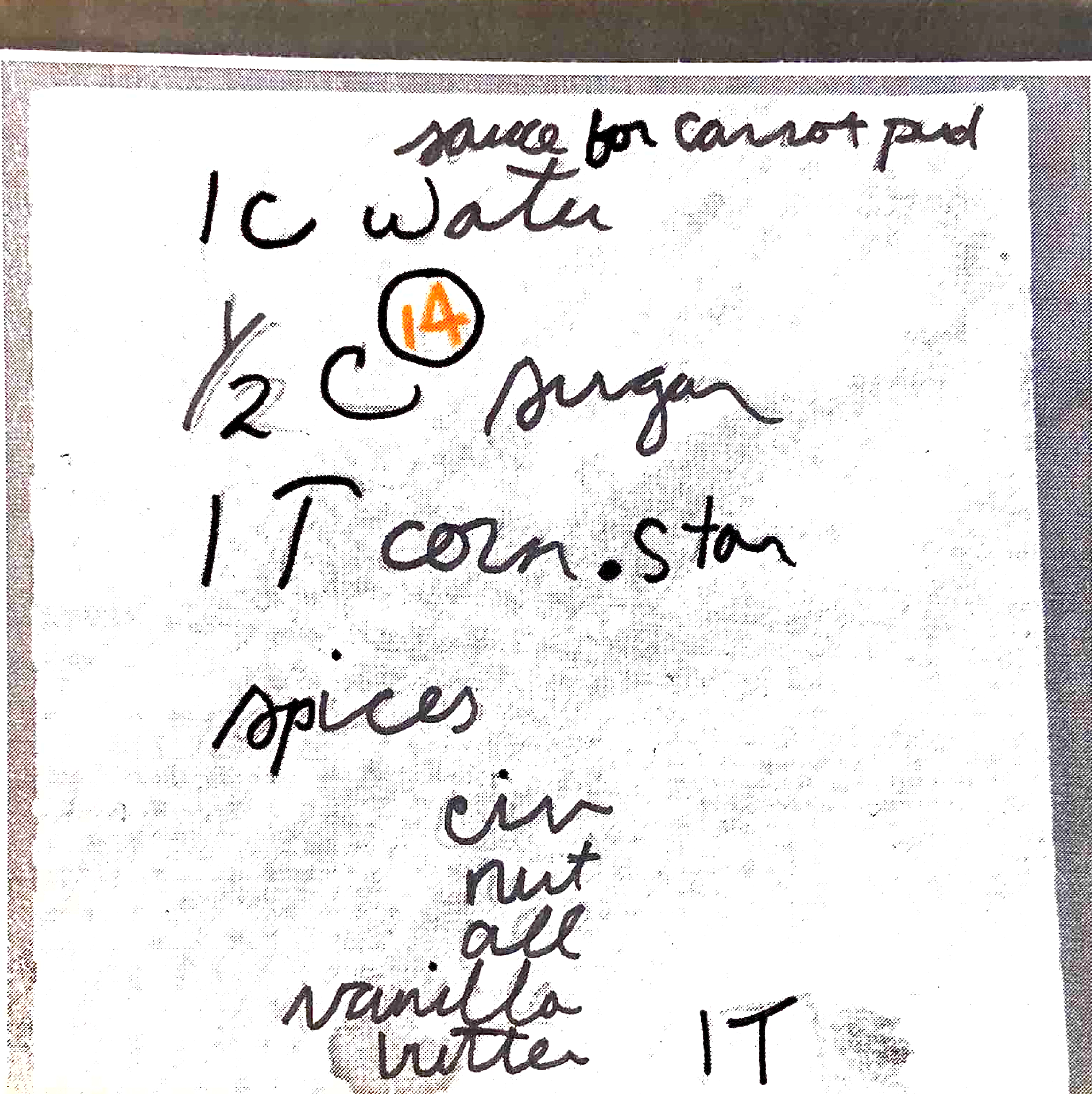 Black & white photo [orange annotation numbers] of a square of paper that could be a post-it note, with the following written on it: sauce for carrot pud / 1 c water / 1/2 c [14] sugar / 1 T corn. star / spices / cin / nut / all / vanilla / butter   1 T