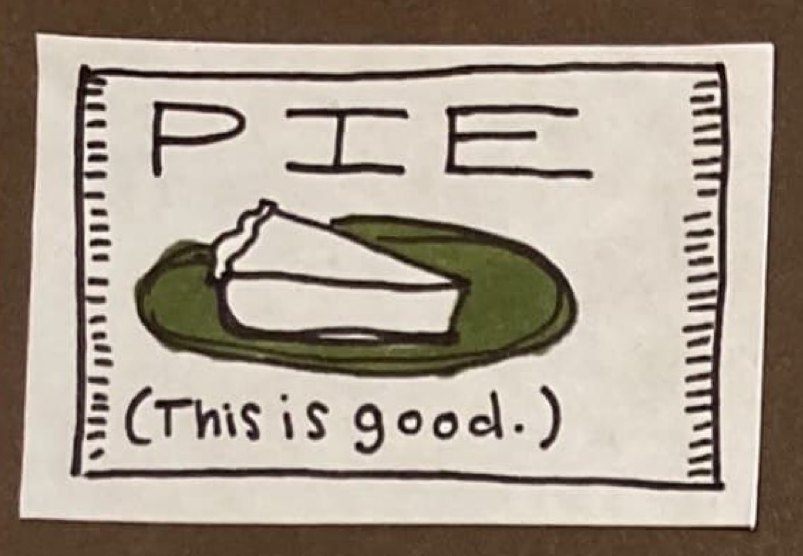 (slice of pie on a green plate) PIE (This is good.)