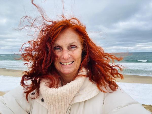 Heidi Straube, relaxing with a favorite photo book, sending love to you