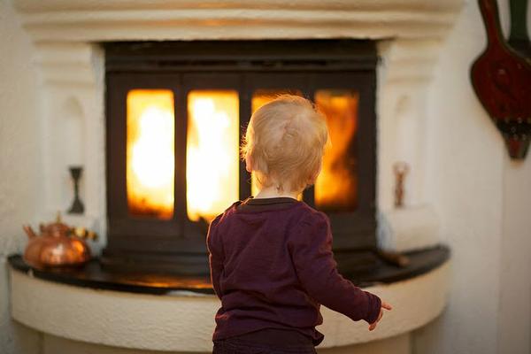 child at fireplace.jpg