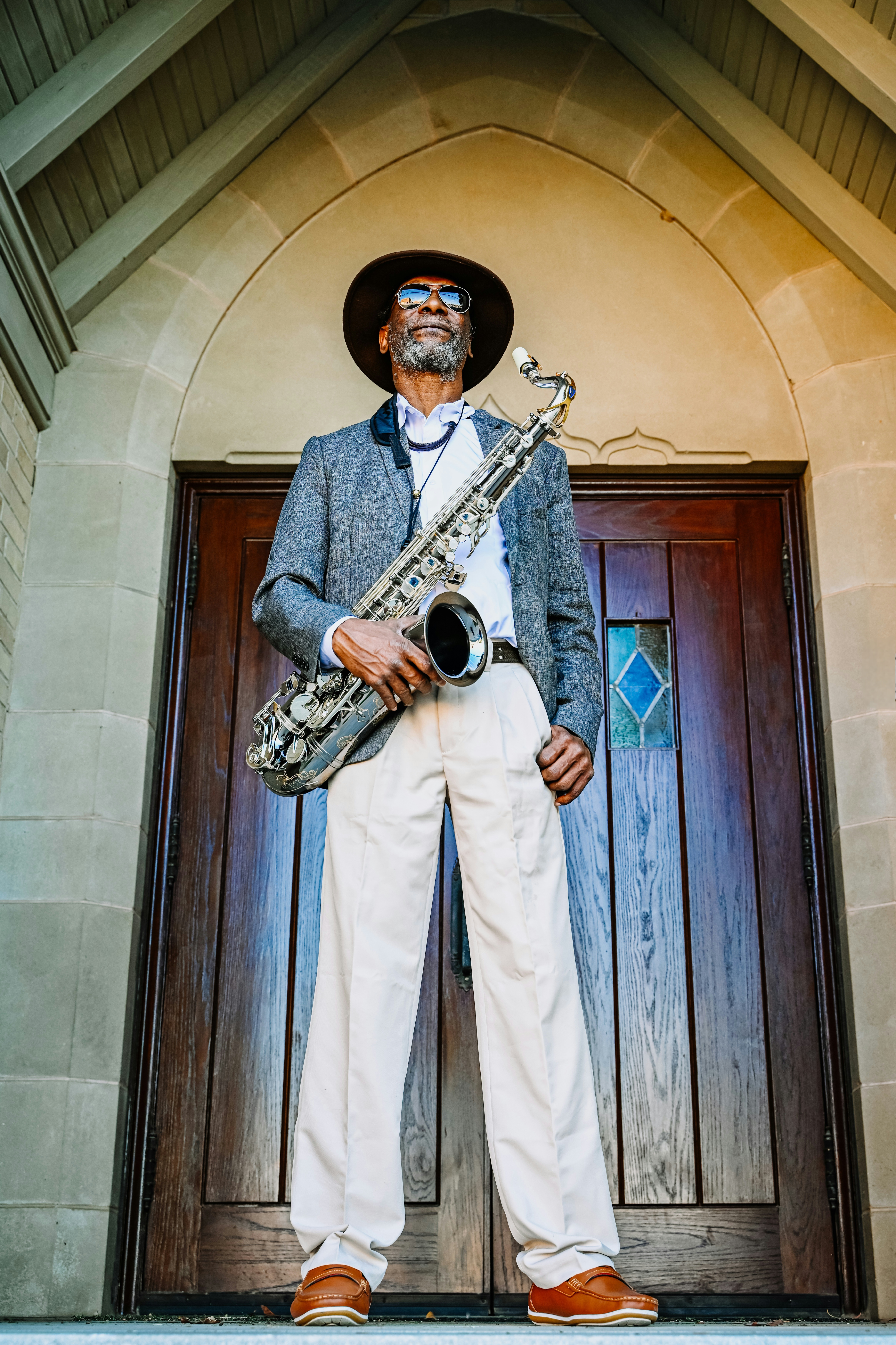 Kevin ‘Saxman’ Brown standing tall with his saxophone