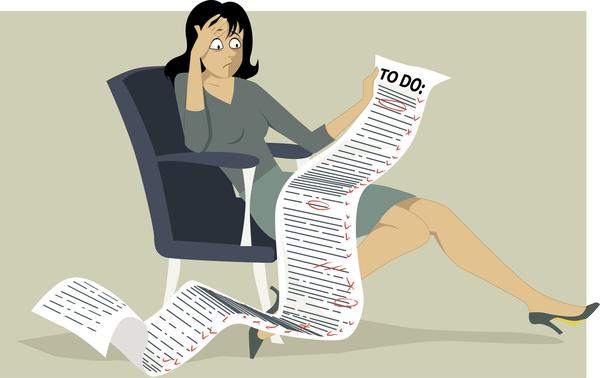 a woman looking at a long to do list