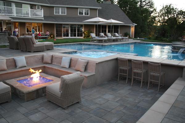 Built in fire pit, seating, swimup bar, and spa
