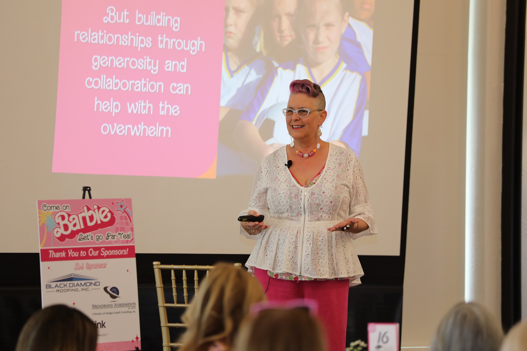 Picture of Lisa speaking to an audience
