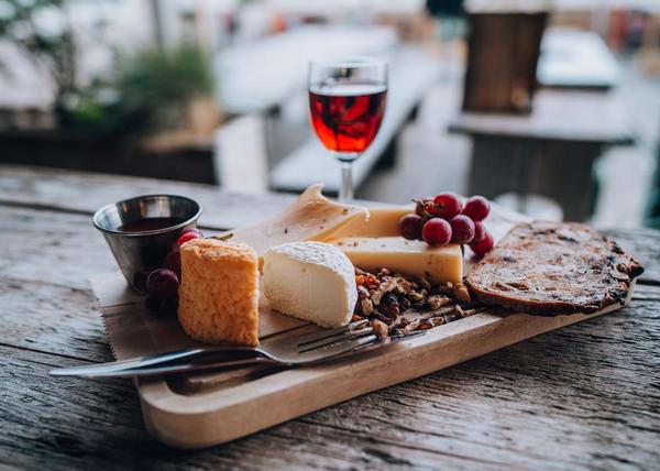 Get paid to eat cheese and drink wine