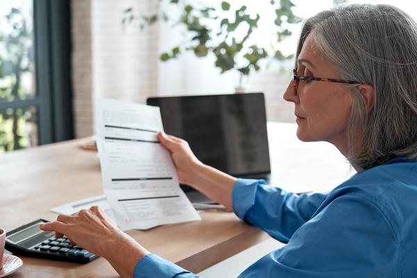 A woman reading a dcoument