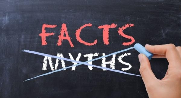 The words facts and myths written on a blackboard