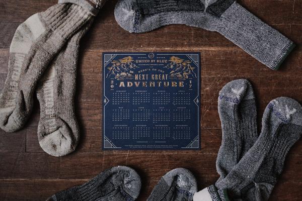 Socks spread around a calendar