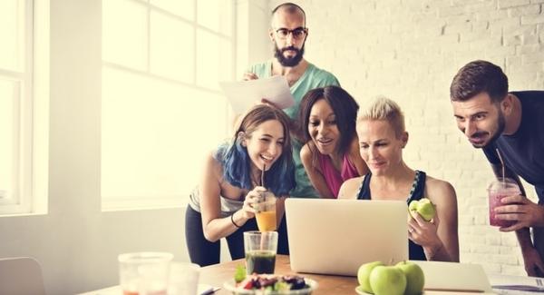 People looking at a laptop
