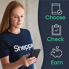 A woman uses Shepper app to earn money