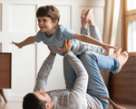 Father lifting his child