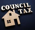 A wooden house and Council Tax
