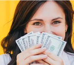 Woman holding a bunch of cash