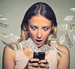 A woman on her phone with money flying out