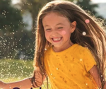 Girl running through water