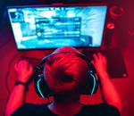 A gamer sits at his computer