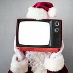 Santa holding a retro TV