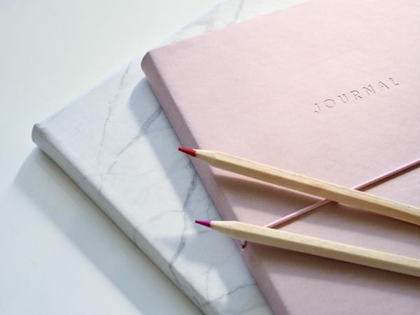 ImaPhoto by Plush Design Studio on Unsplash stack of journalsge