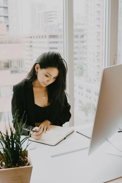 woman at computer actually working