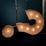A lighted question mark