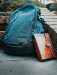 Photo by Josh Appel on Unsplash leather bound journal and backpack