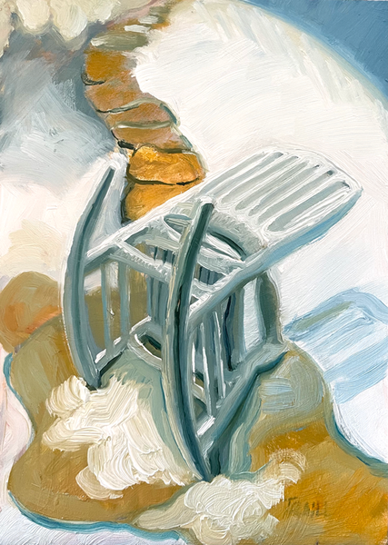 Knocked Over Rocking Chair sits on Snowy landscape with a Yellow Ochre Path