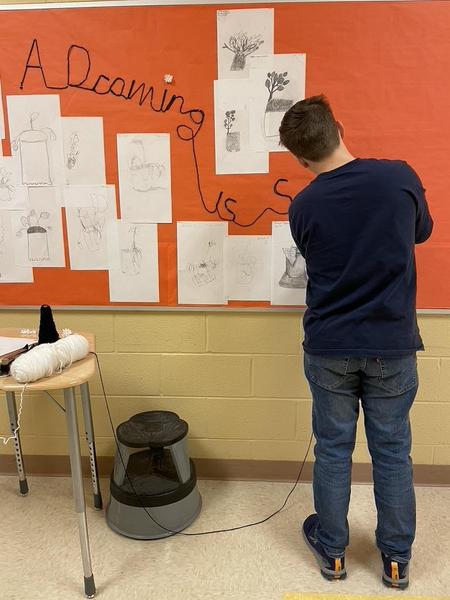 Joel building my bulletin board