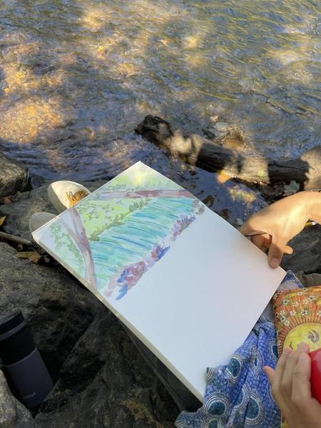 Student watercolor of the dam using her daughter's fluorescent watercolors