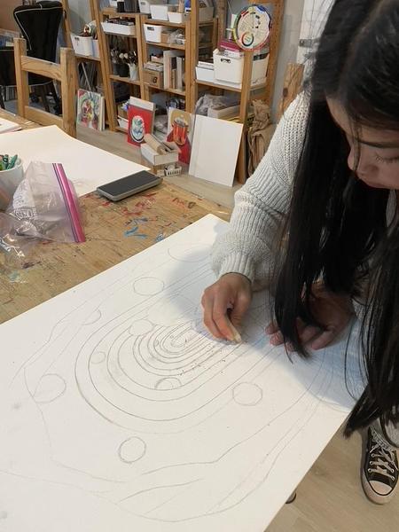 Student Working on Artwork in my studio