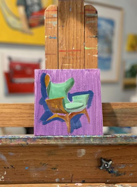 Green Midcentury Modern Chair painting on a purple background on my easel